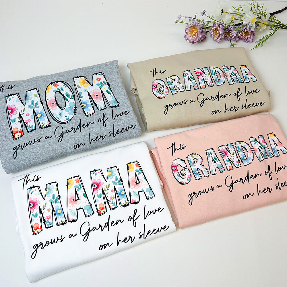 50%OFF⭐️Personalized This Mom Grows A Garden Of Love On Her Sleeve Birth Flower Hoodie